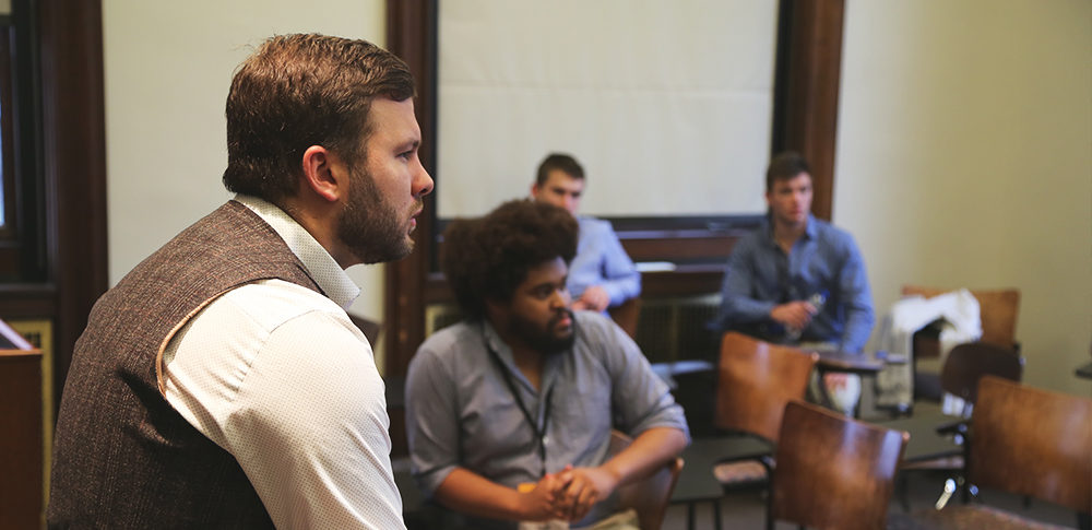 Photo of Tyler Boisvert leading a Leadership Training Institute session.